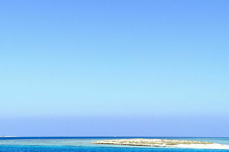 Red sea and blue sky. And white sand.
